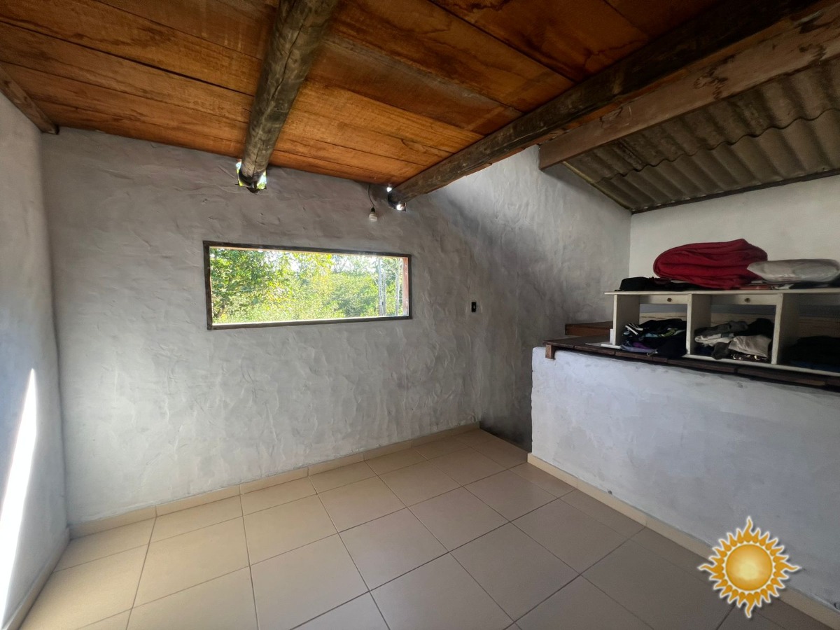 Oportunidade terreno no Perequê Açu com uma pequena casa em final de acabamento !!!